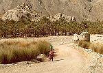 Woman near Bidbid by Peter Justin